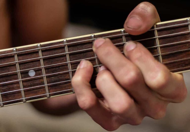 Does Playing Guitar Give You Calluses Toughen Up For Easier Playing